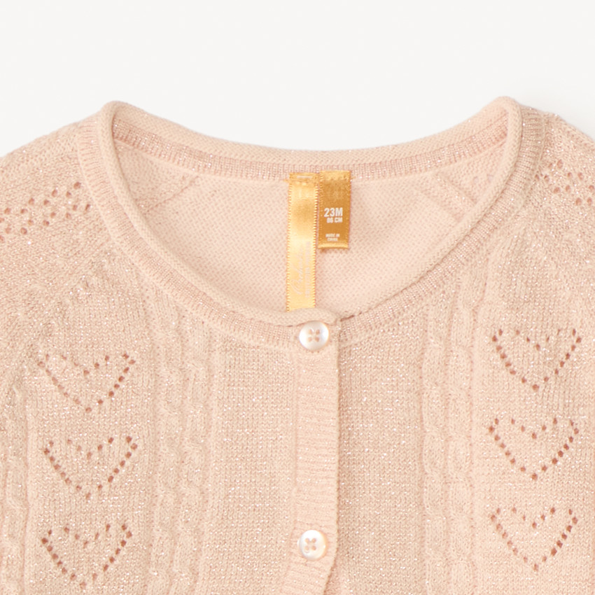 Bolero de manga larga de punto calado y hilo metalizado para niña bebé. 