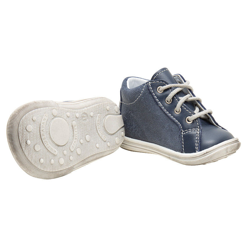 Botines de cuero con cordones y bandas que contrastan cosidas 