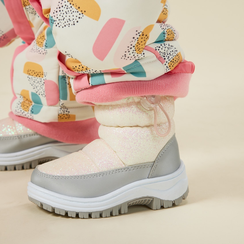 Après-ski pailletés et zippés pour bébé fille 
