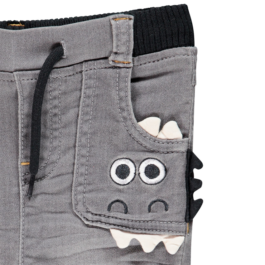 Jeans efecto desgastado motivo monstruo 