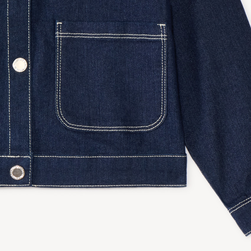 Chaqueta de mezclilla niña con cuello de camisa. 