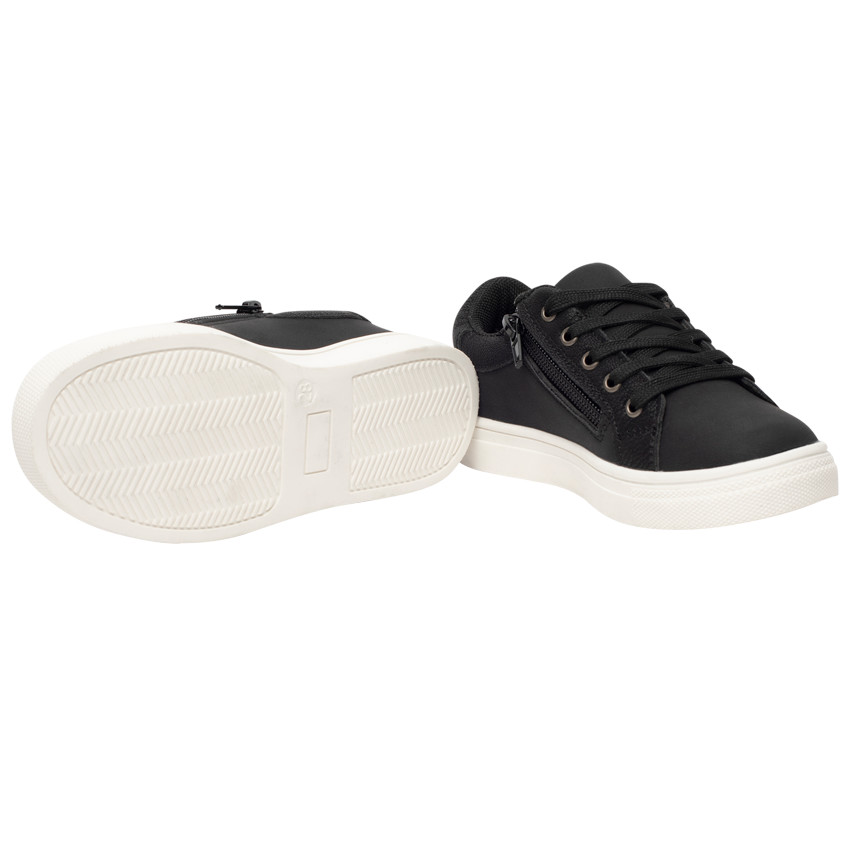 Zapatillas deportivas bajas con cordones y detalles en dos materiales para niño 