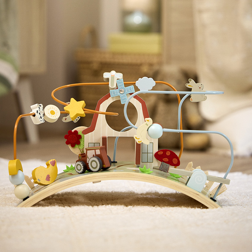 Plancha de actividades de madera con espirales de granja 