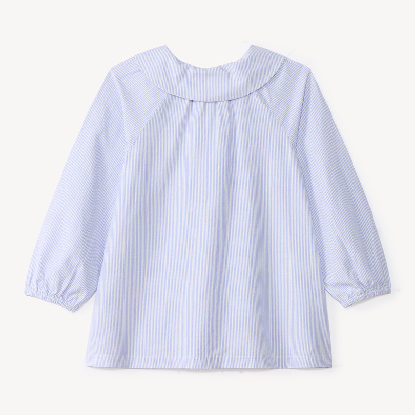 Camisa de niña bebé de manga larga abullonada y a rayas. 
