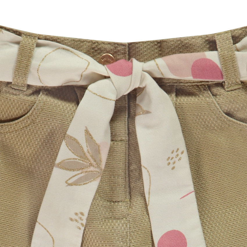Pantalón de tela con cinturilla decorativa para bebé niña 