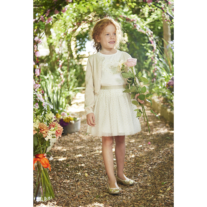 Gilet corto de punto con base festoneada para niña 