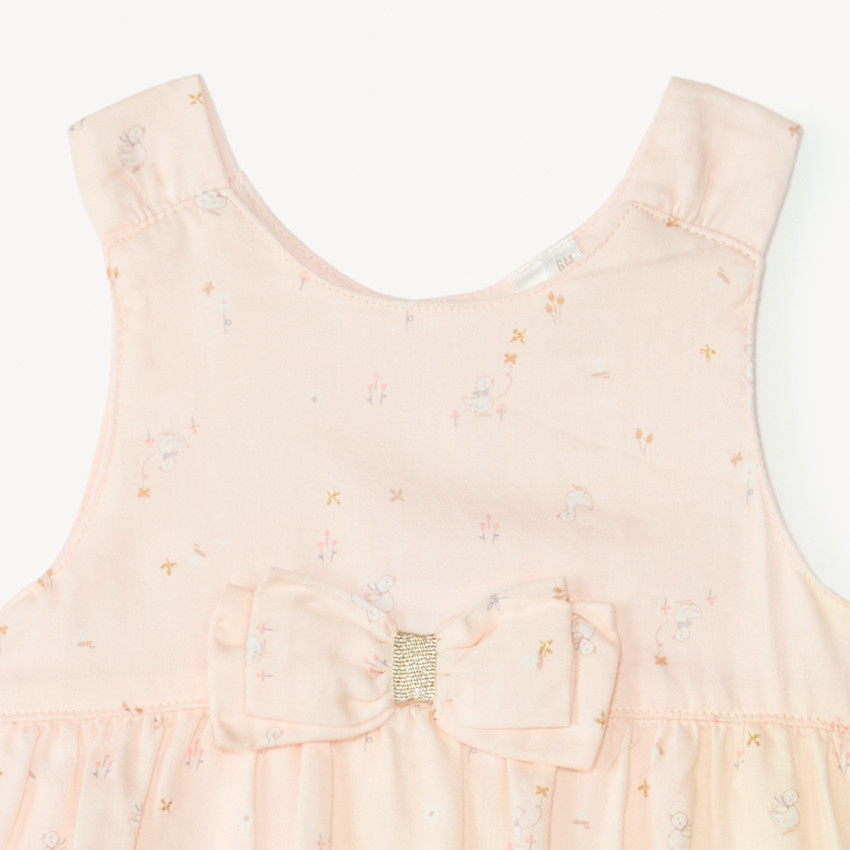 Monosuit corto efecto 2 en 1 con estampado divertido para niña. 