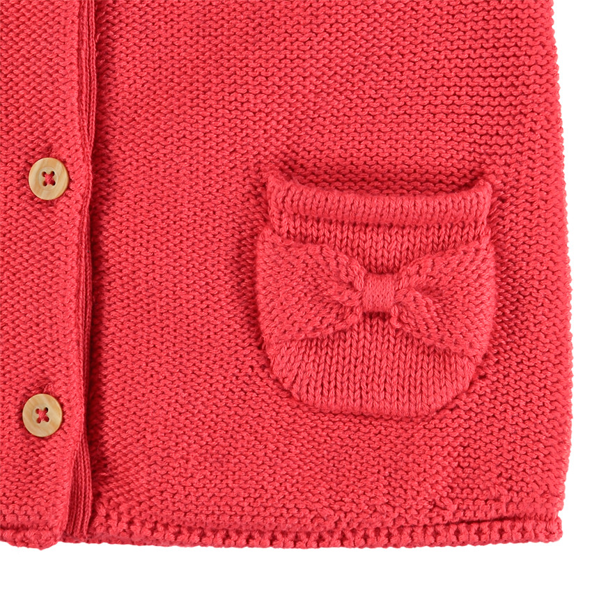 Gilet en tricot rose à poches pour bébé fille 