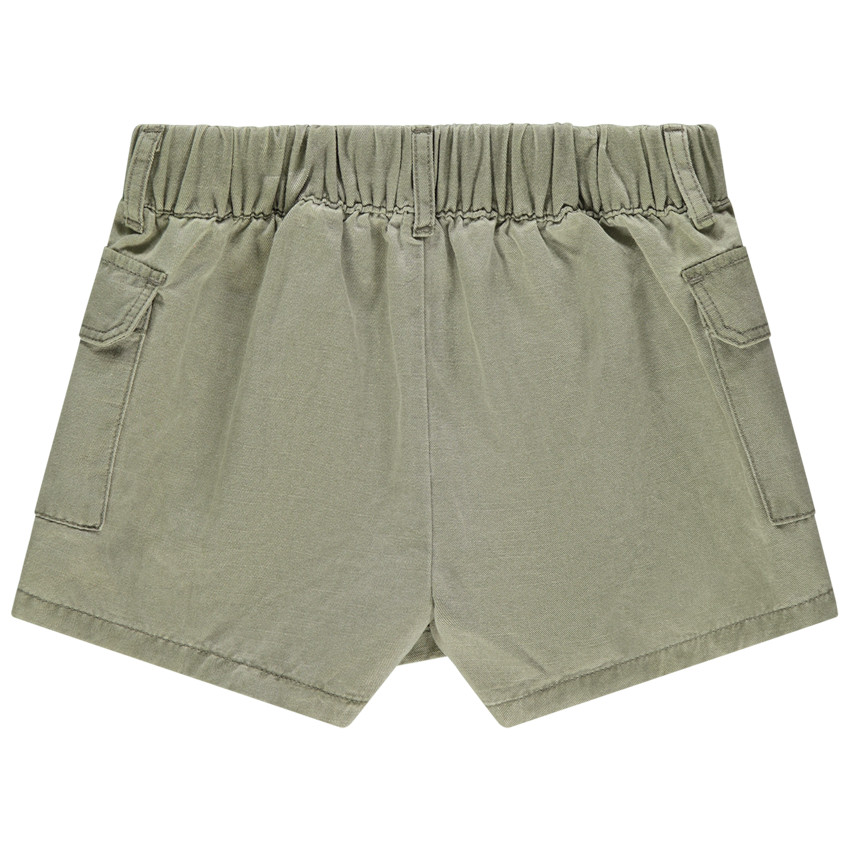 Jupe short en toile à poches et broderies dorées 