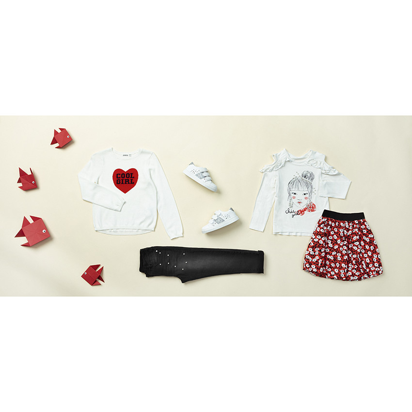 Jeans slim efecto desgastado perlas 