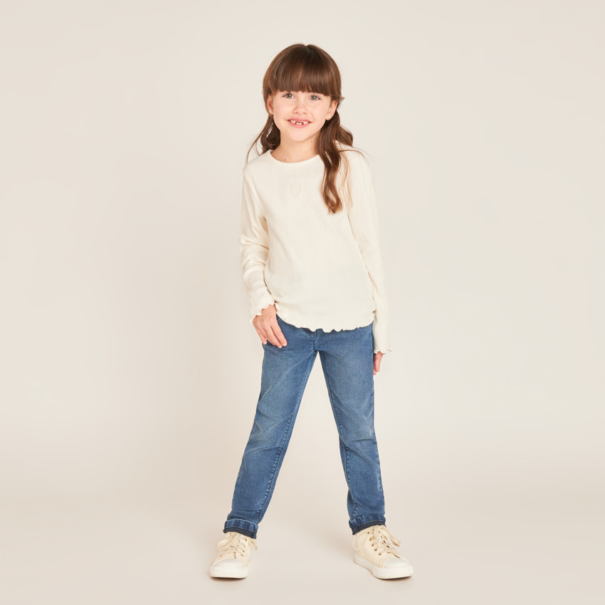 Jeans slim efecto lavado en denim para niña 