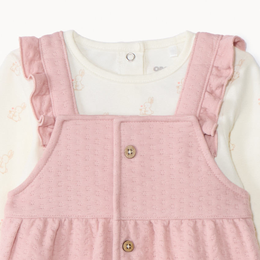 Conjunto de 2 piezas con pichi de motivos calados para niña. 