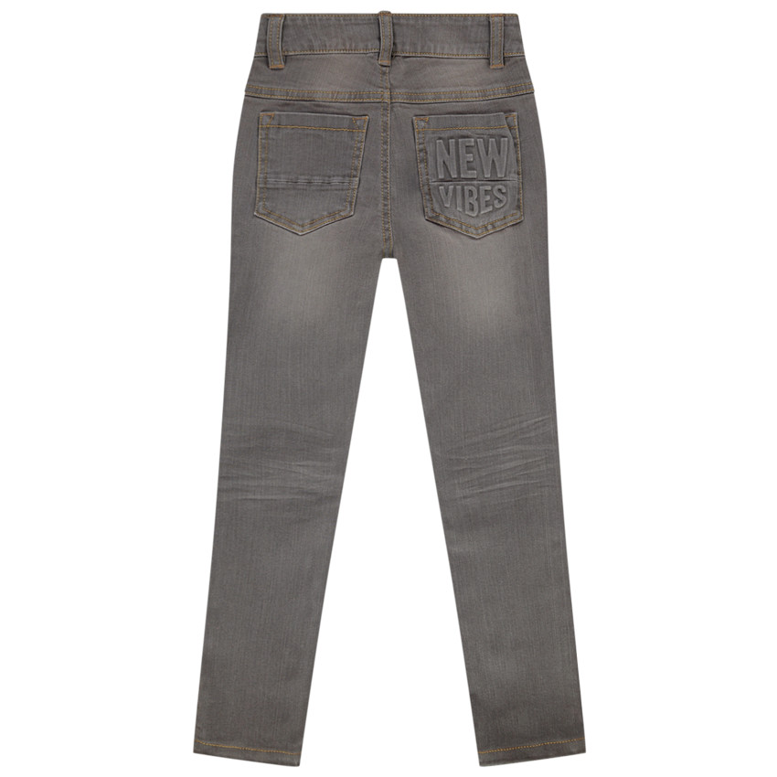 Pantalón skinny efecto desgastado con texto en relieve niño 