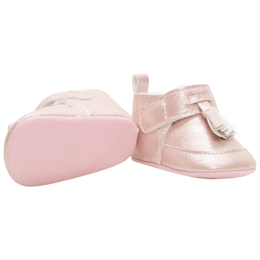 Botines flexibles brillantes con velcro y pompón 