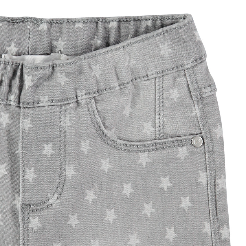 Jeans efecto desgastado con estrellas niña 
