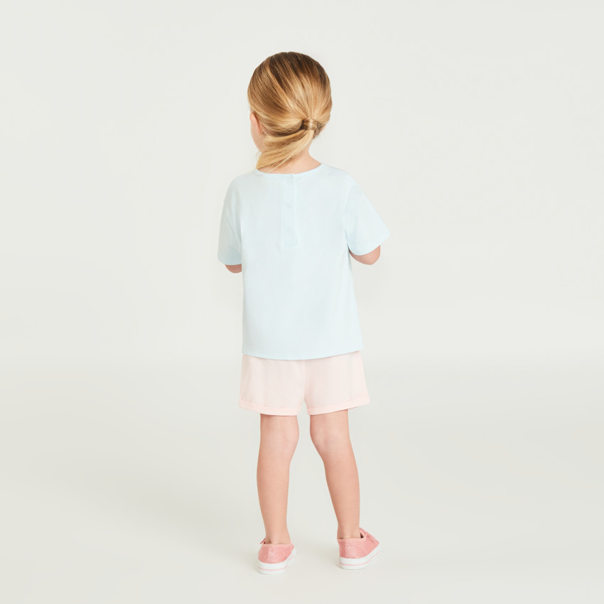 Camiseta de manga corta anudada con Stitch y Angel de Disney para niña. 