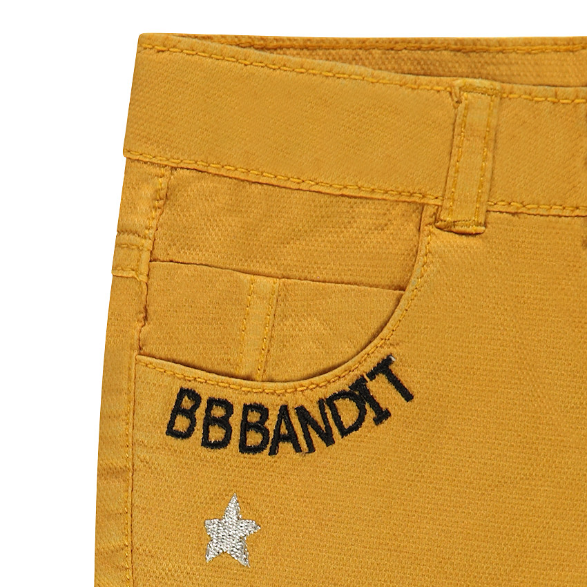 Pantalón de tela de fantasía con parches y bordados  