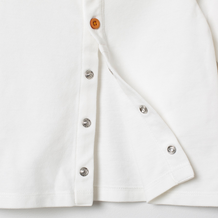 Polo manga larga con bandas y erizo estampado  