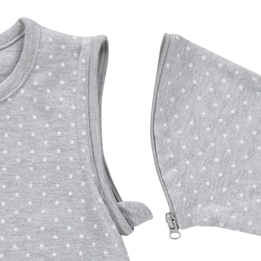 Saquito de punto con estampado de lunares y mangas desmontables 