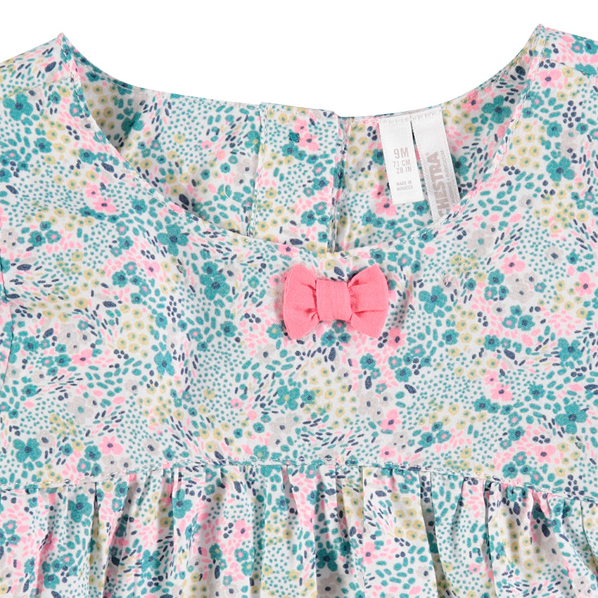 Túnica de manga corta con volantes y flores estampadas 