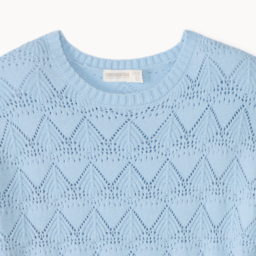 Suéter oversized de punto calado con diseño para niña. 