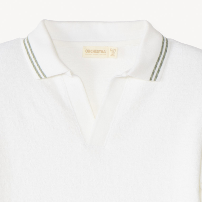 Polo de manga corta de punto liso para niño. 