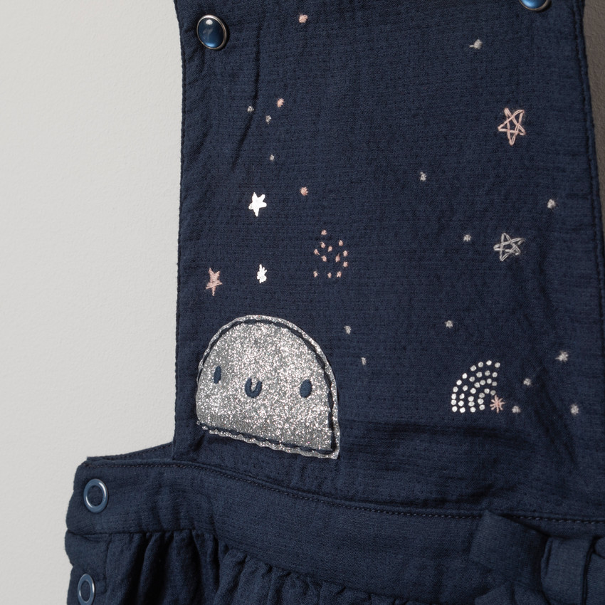 Robe salopette à motifs argentés et noeud 