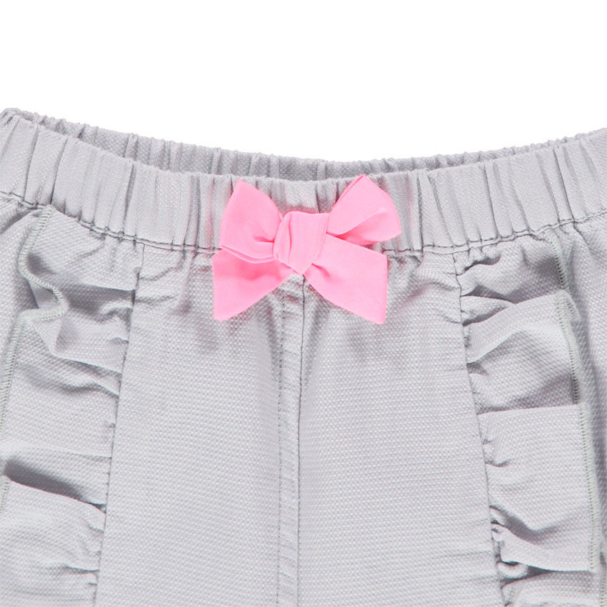 Conjunto de túnica sin mangas de rayas con pantalón con volantes 