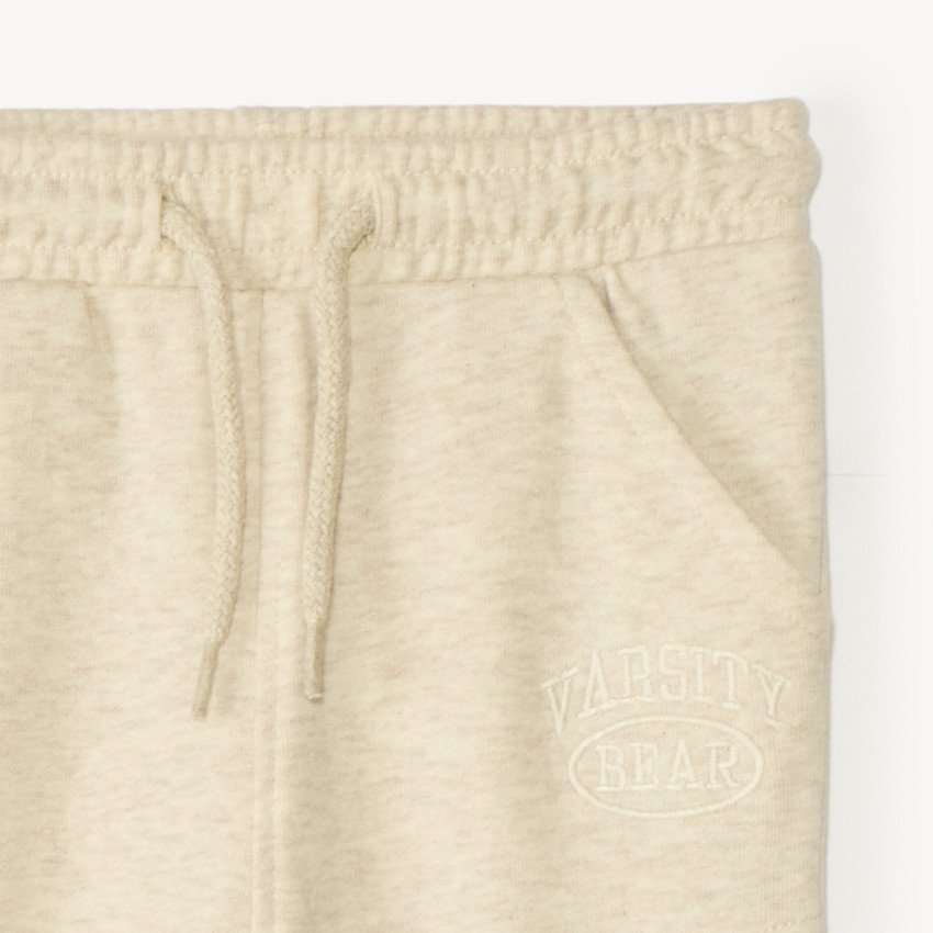 Jogging de felpa lisa con cortes para bebé niño 