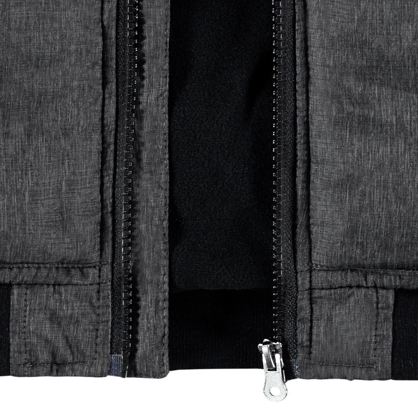 Plumífero acolchado jaspeado con forro micropolar para niño. 