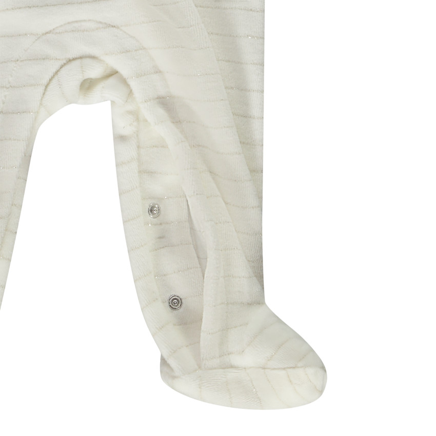 Pelele patch Hedwig Warner para bebé niña con aperturas diferentes según la edad 