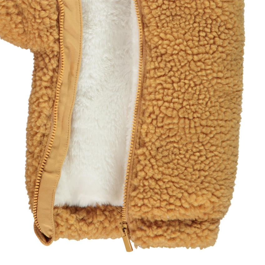 Buzo ourson bicolor para bebé con acabados diferentes según la edad 