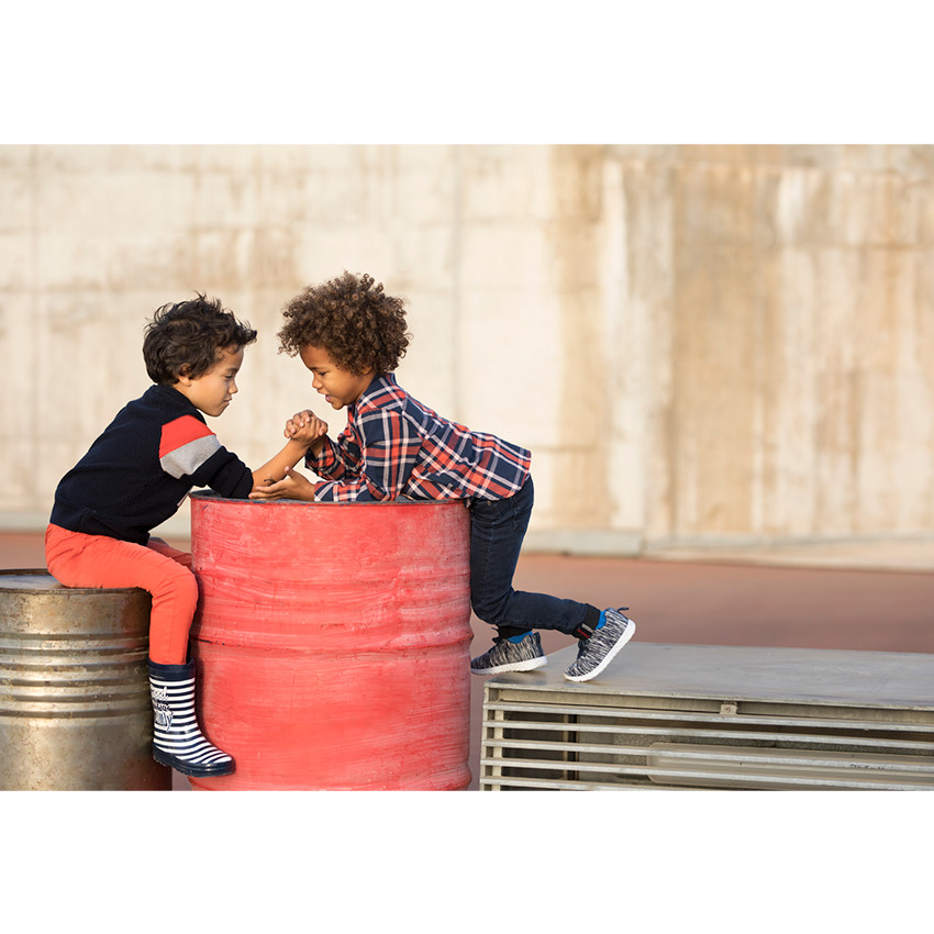 Pantalón de algodón teñido de naranja con efecto desgastado 