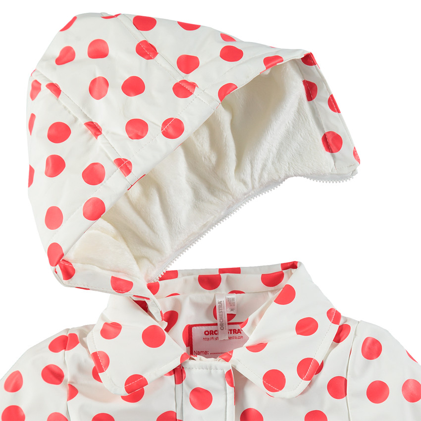 Cortavientos de goma con forro de lunares rojos all over 