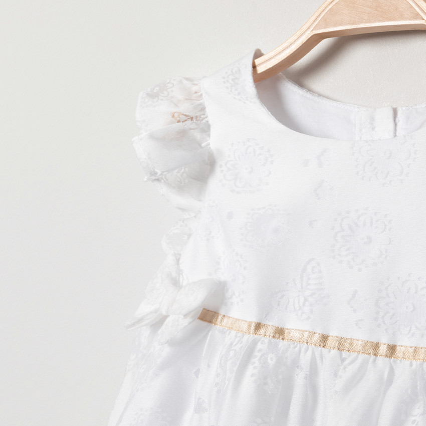 Vestido ceremonia blanco con motivos en punto jacquard 