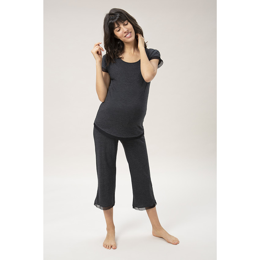 Pantalón pantacourt de punto jaspeado con detalles de tul 