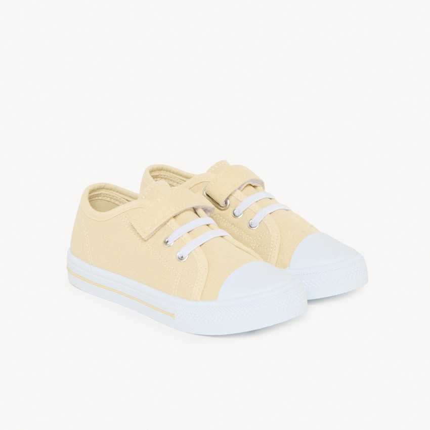 Zapatillas bajas de lona con cordones elásticos y velcro niño 
