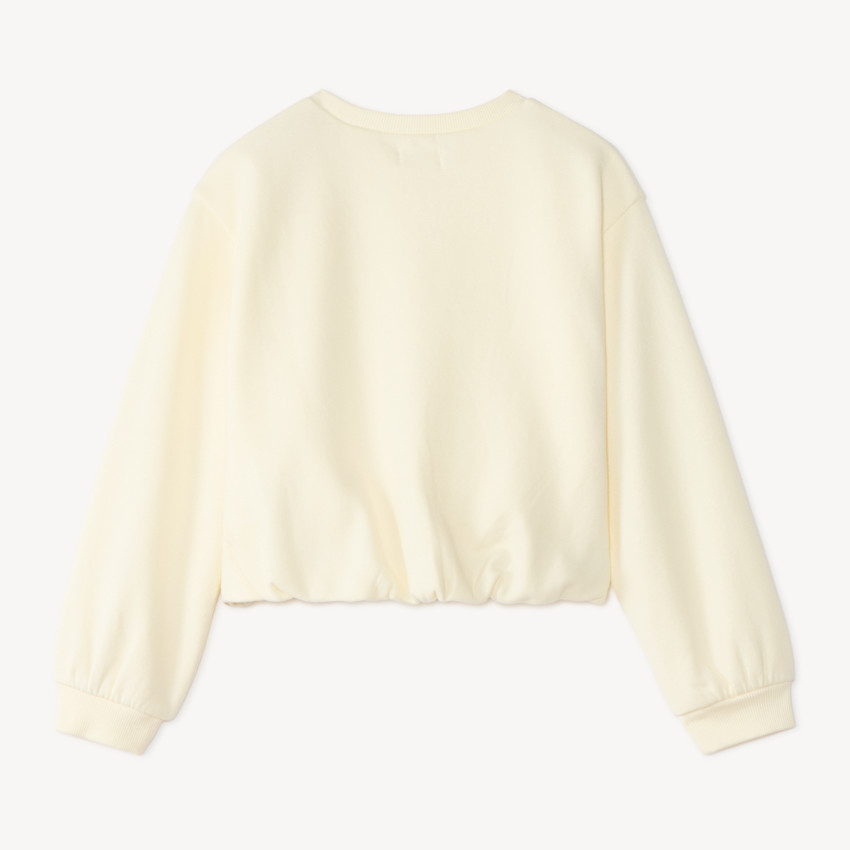 Sudadera de niña de felpa con base elástica y bordado de strass. 